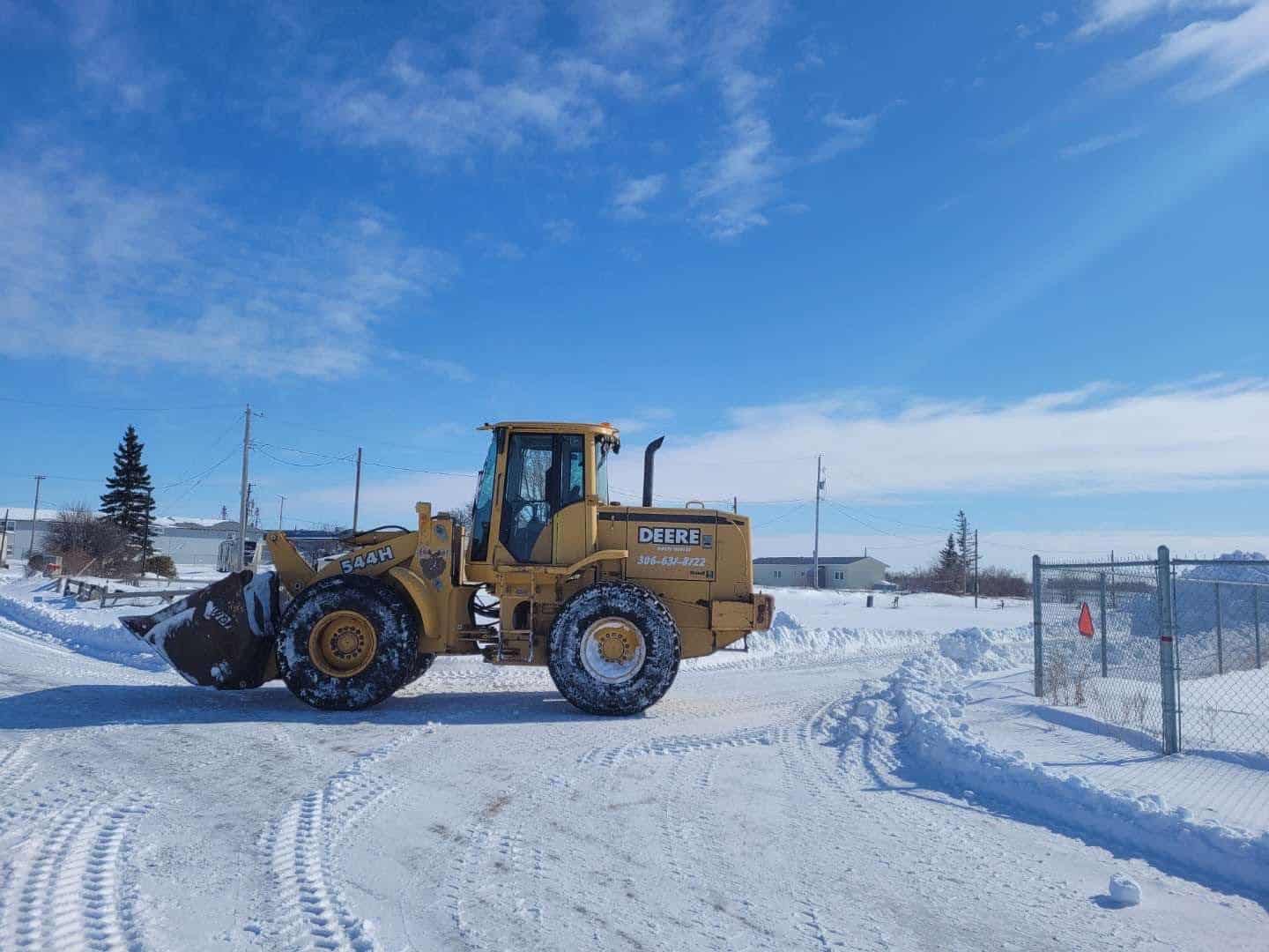 snow removing with truck